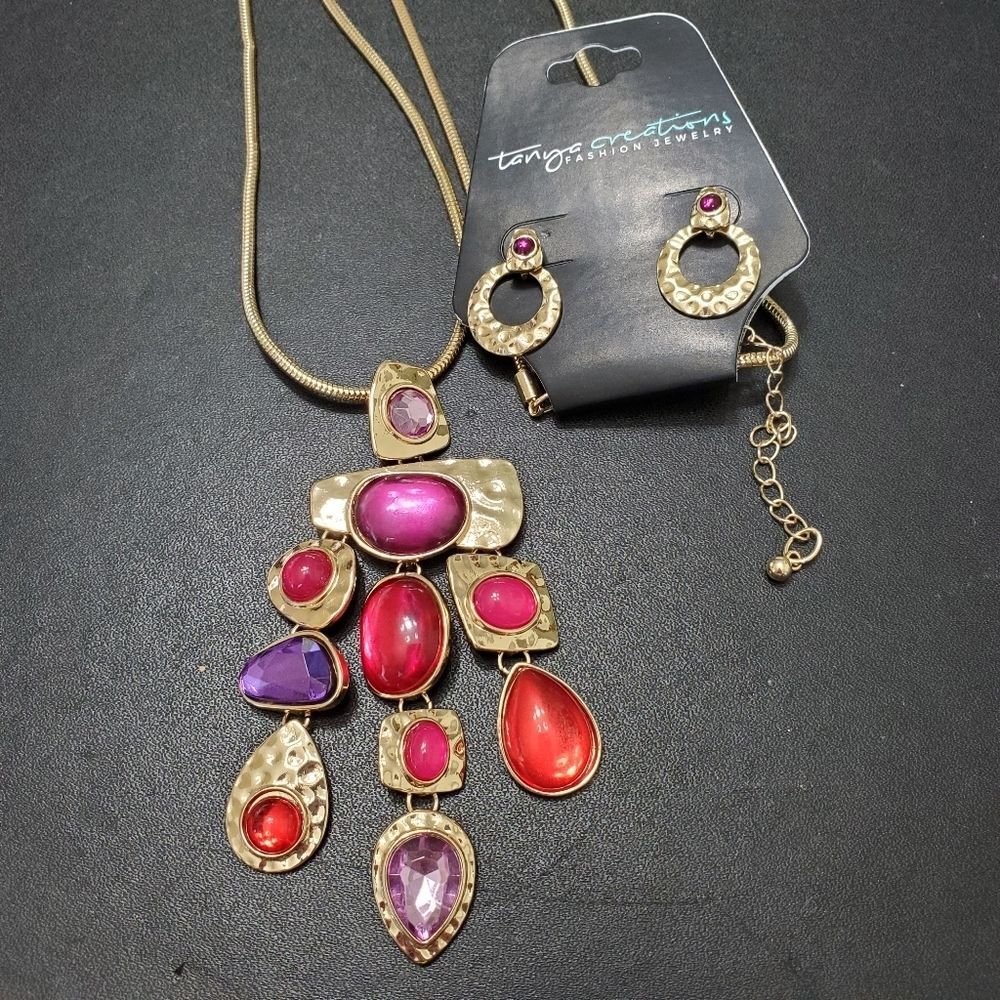 Tanya Creations Gold tone long rhinestone necklace with earrings